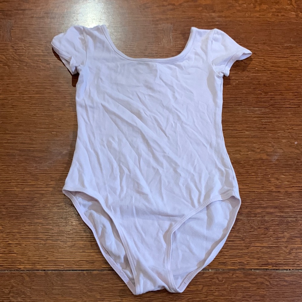 Light pink leotard. Size 6-6X.